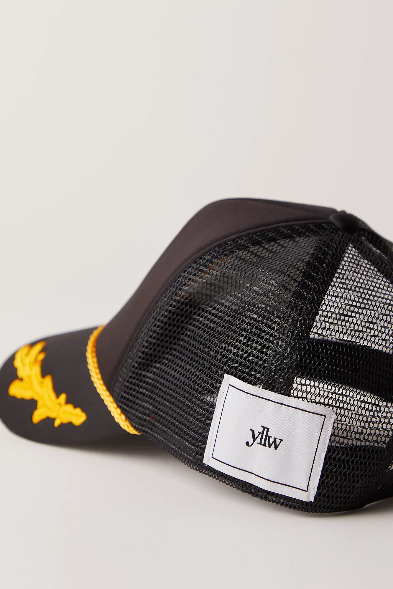 Herald Crest Trucker Hat | Black